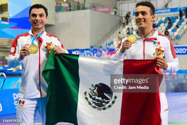 Yahel Castillo and Juan Manuel Celaya of Mexico pose during the Medal Ceremony after Men's Synchronised 3m Springboard Final on Day 8 of Lima 2019...