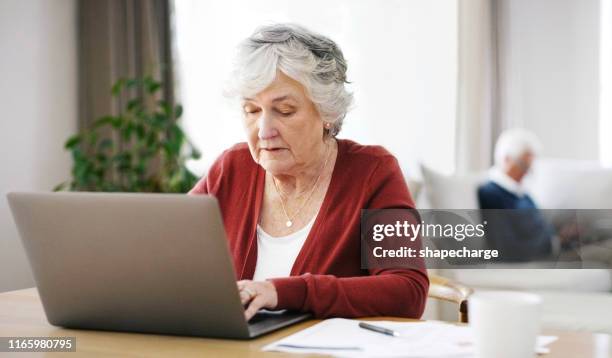 she's got online access to her retirement fund - inheritance tax stock pictures, royalty-free photos & images