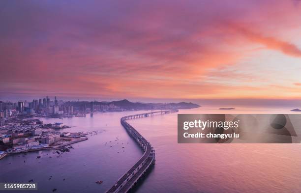 commercial office; skyscraper; night scene - dalian stock pictures, royalty-free photos & images