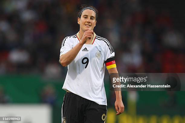 Birgit Prinz of Germany looks on during the women's international friendly match between Germany and Norway at Bruchweg Stadium on June 16, 2011 in...