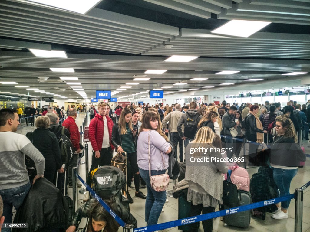 Please Wait In Line People Waiting In Line For Security Check At Airport European ...