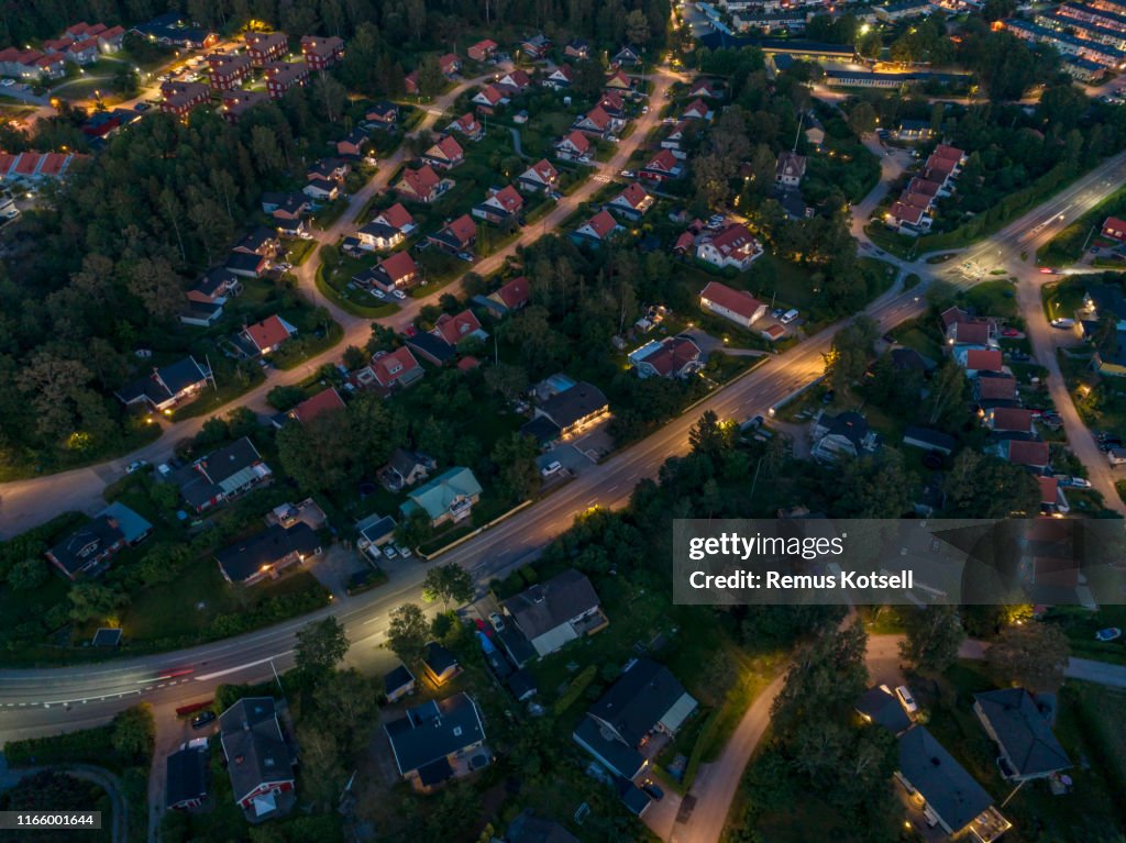 Aerial night view over a small city