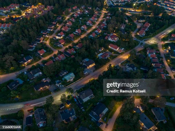 aerial night view over a small city - house sweden stock pictures, royalty-free photos & images