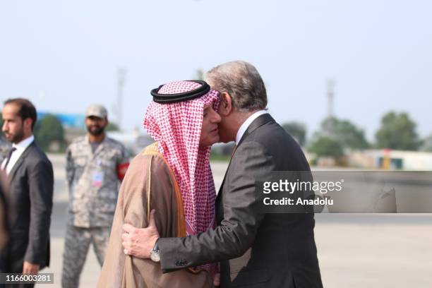 Pakistan's Foreign Minister, Shah Mehmood Qureshi welcomes Saudi Minister of State for Foreign Affairs Adel al-Jubeir upon his arrival at Noor Khan...