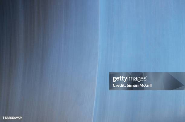 two burnished stainless steel surfaces with brushed texture - brushed steel stock pictures, royalty-free photos & images
