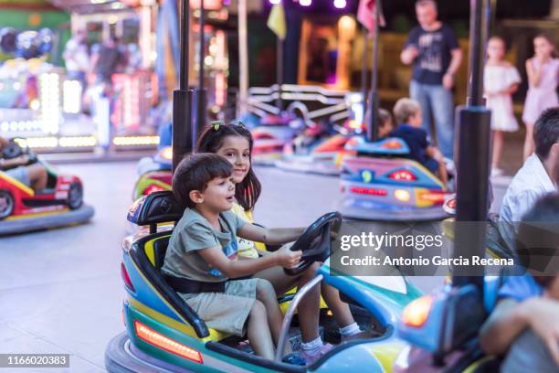 Little Kid Rides 415 Family Amusement Park Night Stock Photos, High-Res Pictures, and ...