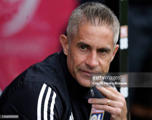 Sylvinho of Lyon during the Pre-Season Friendly match between AFC Bournemouth and Lyon at Vitality Stadium on August 3, 2019 in Bournemouth, England.