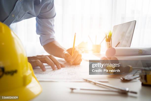 data working and tablet laptop - architects of light stock pictures, royalty-free photos & images