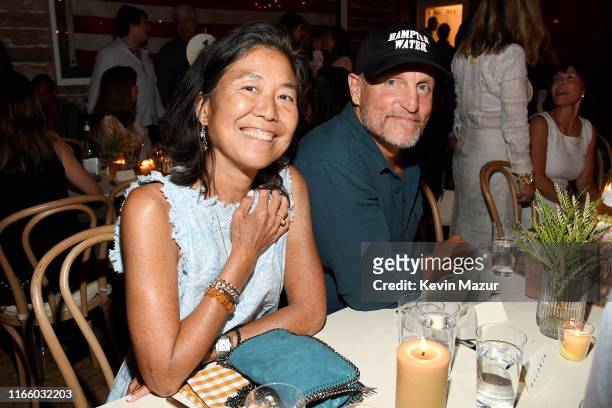 Laura Louie and Woody Harrelson attend Apollo in the Hamptons 2019: Hosted by Ronald O. Perelman at The Creeks on August 03, 2019 in East Hampton,...