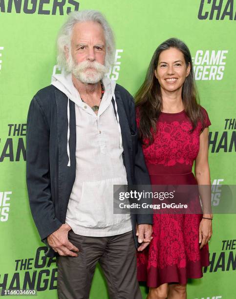 Bob Weir and Natascha Munter arrive at the LA Premiere Of "The Game Changers" at ArcLight Hollywood on September 4, 2019 in Hollywood, California.