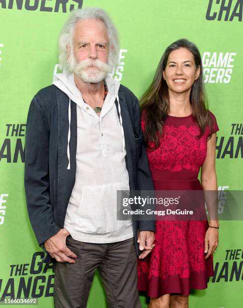 Bob Weir and Natascha Munter arrive at the LA Premiere Of "The Game Changers" at ArcLight Hollywood on September 4, 2019 in Hollywood, California.