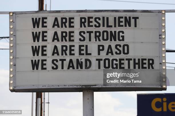 Sign is posted near the scene of a mass shooting at a Walmart which left at least 20 people dead on August 4, 2019 in El Paso, Texas. A 21-year-old...