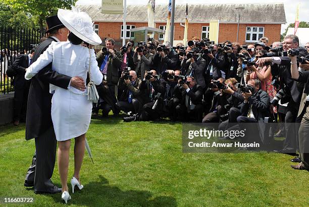 Sir Bruce Forsyth and Lady Wilnelia Forsyth face the photographers as they attend Ladies Day at Royal Ascot on June 16, 2011 in Ascot, United Kingdom.