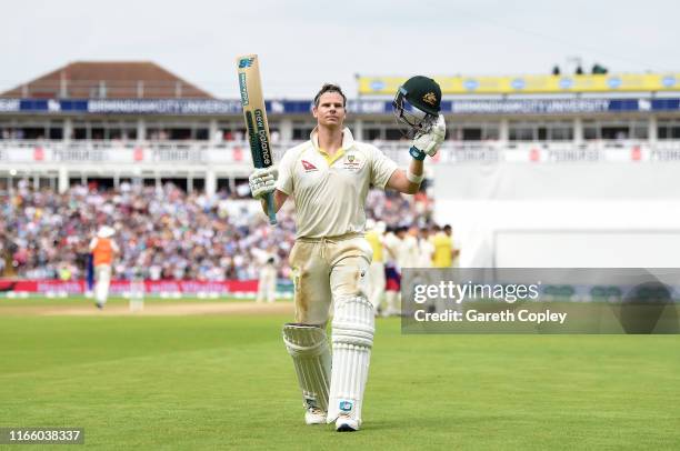 Steven Smith of Australia salutes the crowd as he leaves the field after being dismissed by Chris Woakes of England during day four of the 1st...