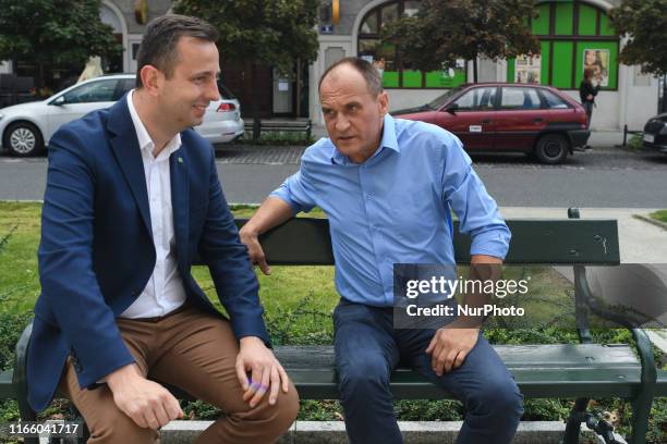 Wladysaw Kosiniak-Kamysz, the chairman of the Polish People's Party , and Pawel Kukiz, the leader of Kukiz'15 political party, chat atfter the press...