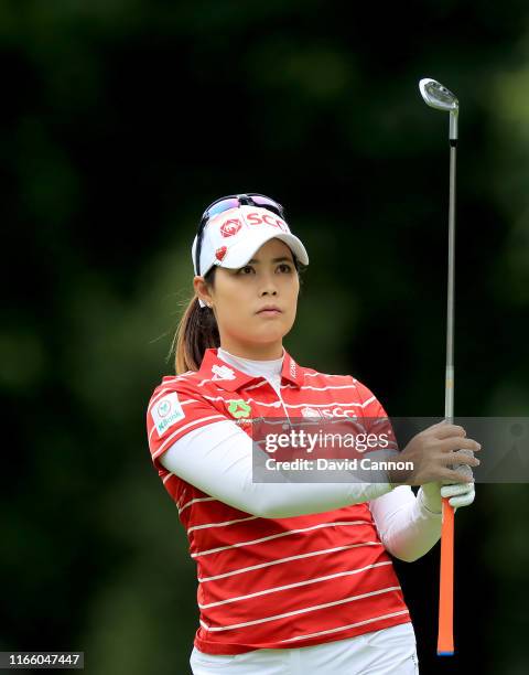 Moriya Jutanugarn of Thailand waits to play her second shot on the par 4, first hole during the final round of the AIG Women's British Open on the...