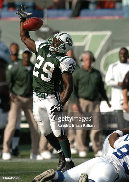 New York Jets running back Leon Washington goes up for a ball on the final play of the game against the Indianapolis Colts at Giants Stadium, East...