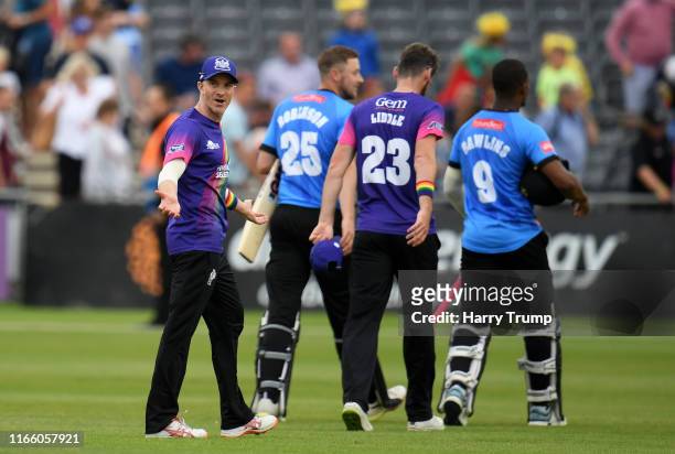 Michael Klinger of Gloucestershire reacts as he questions a over rate penalty leading to a 6 run penalty with Umpire Ian Gould during the Vitality...