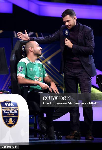 Mo Harkous of Germany speaks with Spencer Owen prior to the Final against Mosaad Aldossary of Saudi Arabia during Finals day of the FIFA eWorld Cup...