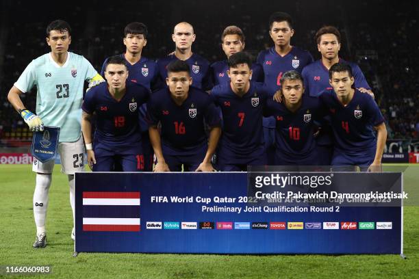 Thailand players line up for the team photos prior to the FIFA World Cup Asian second qualifier match between Thailand and Vietnam at Thammasat...