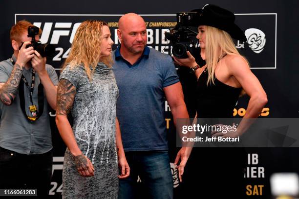 Joanne Calderwood of Scotland and Andrea Lee face off during the UFC 242 Ultimate Media Day at the Yas Hotel on September 5, 2019 in Abu Dhabi,...