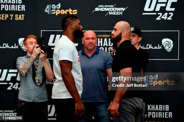 Curtis Blaydes and Shamil Abdurakhimov of Russia face off during the UFC 242 Ultimate Media Day at the Yas Hotel on September 5, 2019 in Abu Dhabi,...