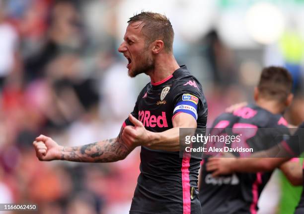 Liam Cooper of Leeds United celebrates Jack Harrison of Leeds United's goal during the Sky Bet Championship match between Bristol City and Leeds...