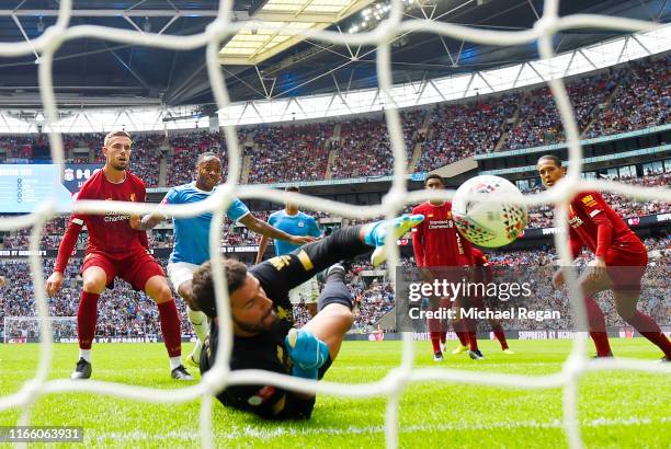 Raheem Sterling of Manchester City scores his team's first goal during the FA Community Shield match between Liverpool and Manchester City at Wembley...