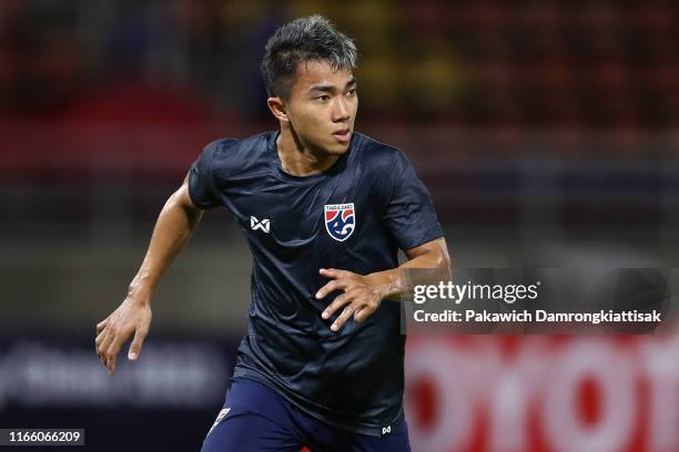 Chanathip Songkrasin of Thailand in action prior to the FIFA World Cup Asian second qualifier match between Thailand and Vietnam at Thammasat Stadium...