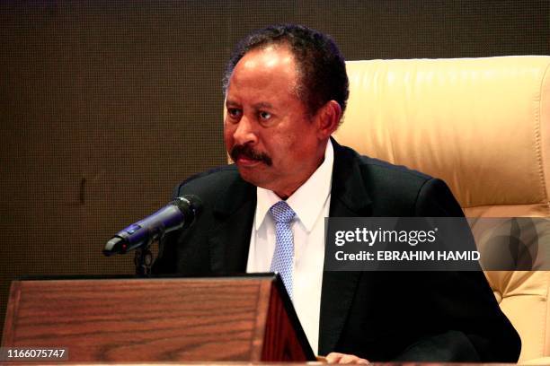 Sudan's new Prime Minister Abdalla Hamdok speaks during a press conference unveiling the first cabinet since veteran leader Omar al-Bashir's...