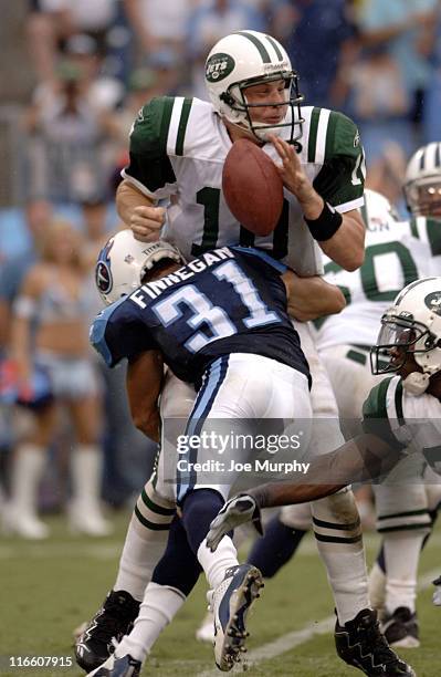 Titans Cortland Finnegan sacks Chad Pennington and forces a fumble during second half action as the New York Jets beat the Tennessee Titans 23-16 on...