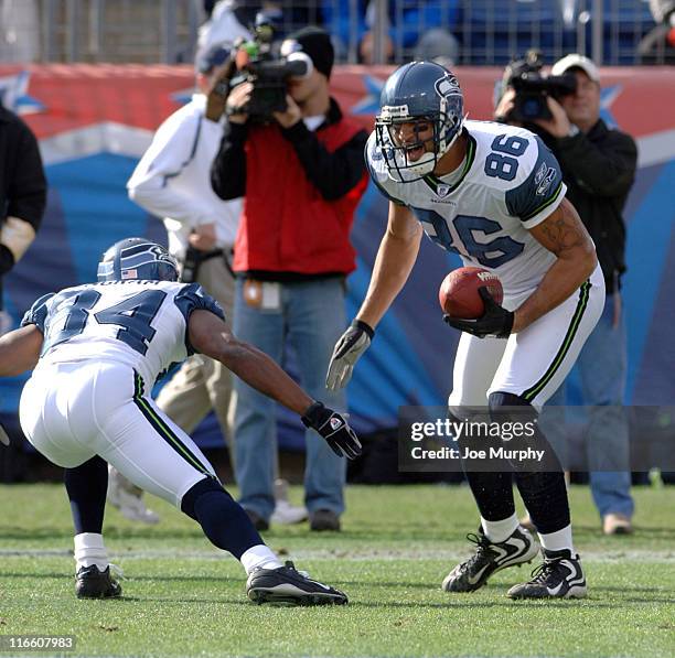 Seahawks Jerramy Stevens celebrates his touchdown with Bobby Engram versus Tennessee at The Coliseum in Nashville, Tennessee, Dec. 18, 2005.