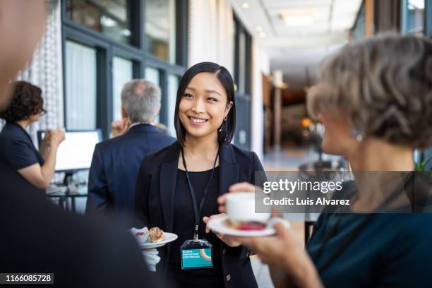 businesswomen discussing during coffee break in hotel - korean people 個照片及圖片檔