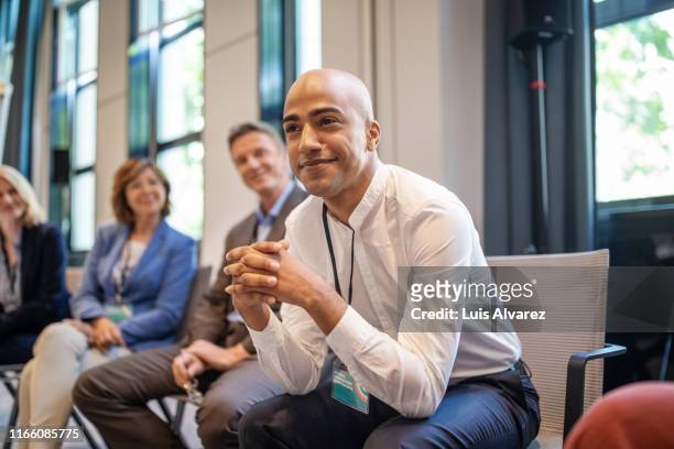 businessman at a networking seminar - panelist stock pictures, royalty-free photos & images