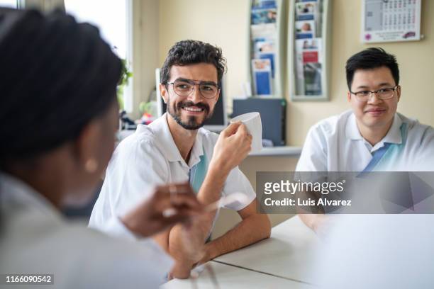 Medical staff having a casual chat during a break in hospital