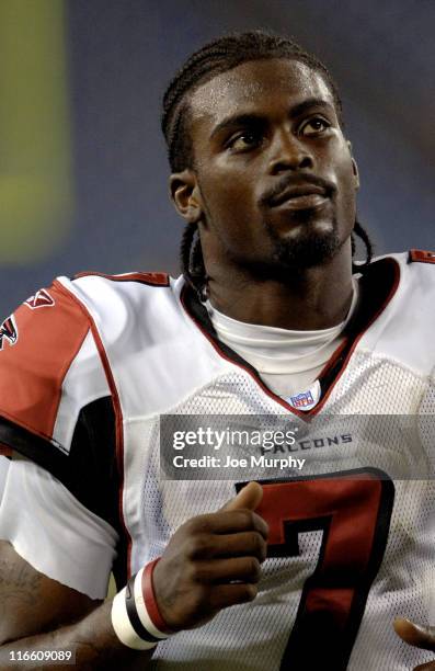 Michael Vick walks off the field during second half action. The Atlanta Falcons beat the Tennessee Titans 20-6 on August 26, 2006 at The Coliseum in...