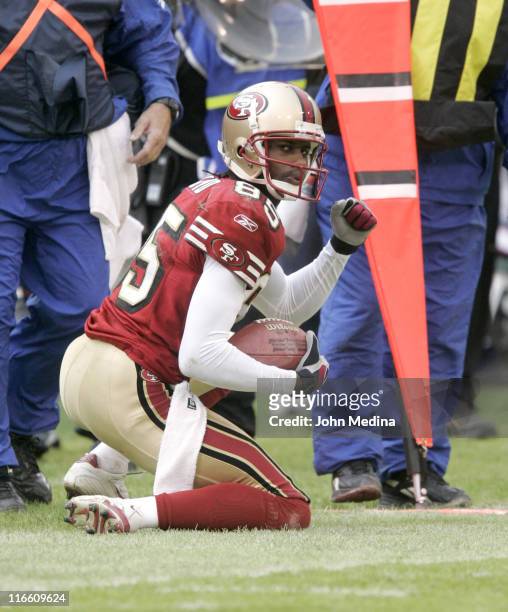 San Francisco receiver Brandon Lloyd celebrates making a first down catch during the 49ers 20-17 overtime defeat of the Houston Texans January 1,...