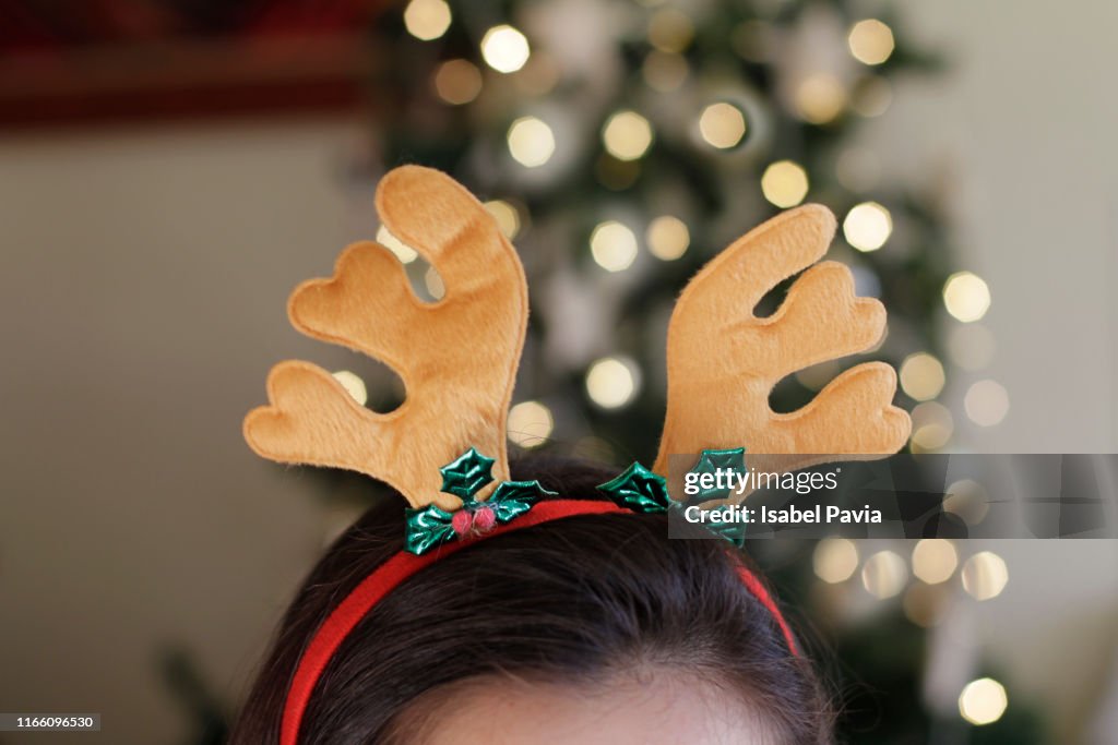 Woman with Christmas Reindeer Headband