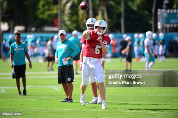 Jake Rudock of the Miami Dolphins throws the ball in practice drills during training camp at Baptist Health Training Facility at Nova Southern...