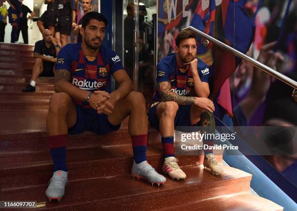 Luis Suarez and Lionel Messi of Barcelona before the match between FC Barcelona and Arsenal at Nou Camp on August 04, 2019 in Barcelona, Spain.