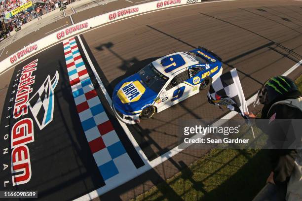 Chase Elliott, driver of the NAPA AUTO PARTS Chevrolet, takes the checkered flag to win the Monster Energy NASCAR Cup Series Go Bowling at The Glen...
