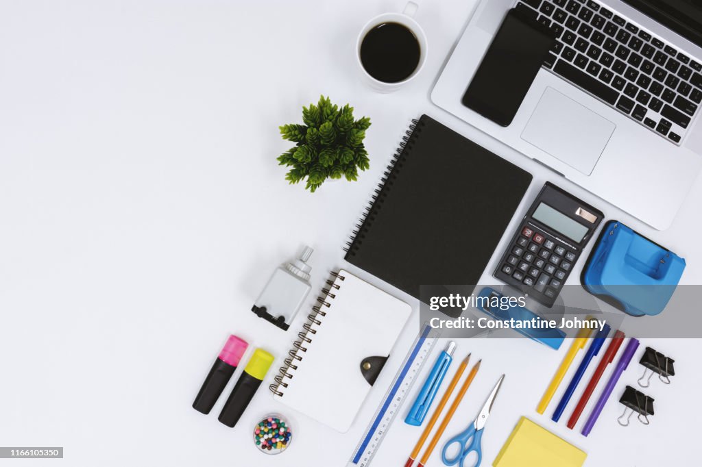 Top View Of Laptop Notebook Coffee And Office Supply Items On White Desk  High-Res Stock Photo - Getty Images