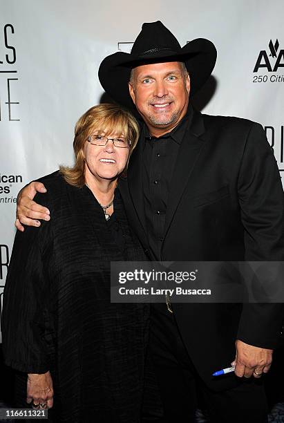 Songwriters Hall of Fame President and CEO Linda Moran and inductee Garth Brooks attend the Songwriters Hall of Fame 42nd Annual Induction and Awards...