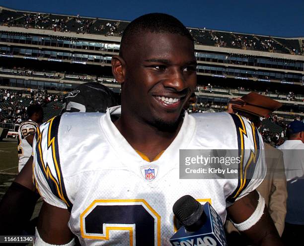 San Diego Chargers running back LaDainian Tomlinson smiles as he walks off the field after 27-14 victory over the Oakland Raiders at McAfee Coliseum...