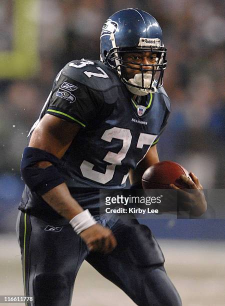 Seattle Seahawks running back Shaun Alexander rushed up field during 34-24 victory over the Green Bay Packers in the snow in ESPN Monday Night...