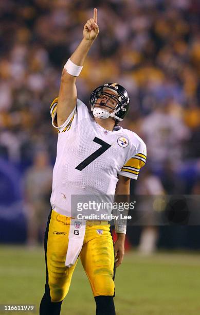 Pittsburgh Steelers quarterback Ben Roethlisberger points skyward in celebration after a throwing a fourth-quarter touchdown in 24-22 victory over...