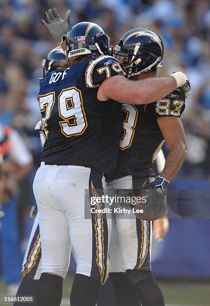 San Diego Chargers receiver Vincent Jackson, right, is congratulated by Mike Goff after scoring on a 14-yard touchdown pass in the second quarter of...