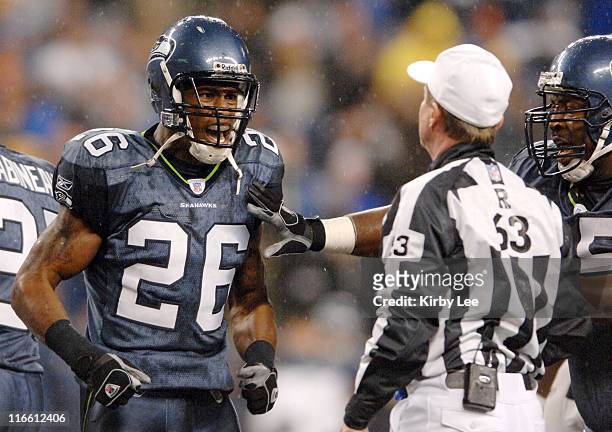 Seattle Seahawks free safety Ken Hamlin argues with referee Bill Carollo during the Monday night football game between the Seattle Seahawks and the...