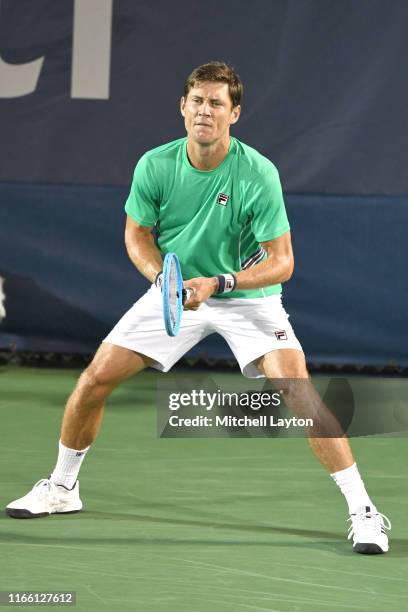 Tim Smyczek of Australia prepares for a shot from Matthew Ebden of the Australia during Day 1 of the Citi Open at Rock Creek Tennis Center on July...