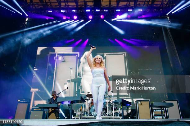 James Shaw and Emily Haines of Metric performs at the Osheaga Music and Art Festival at Parc Jean-Drapeau on August 04, 2019 in Montreal, Canada.